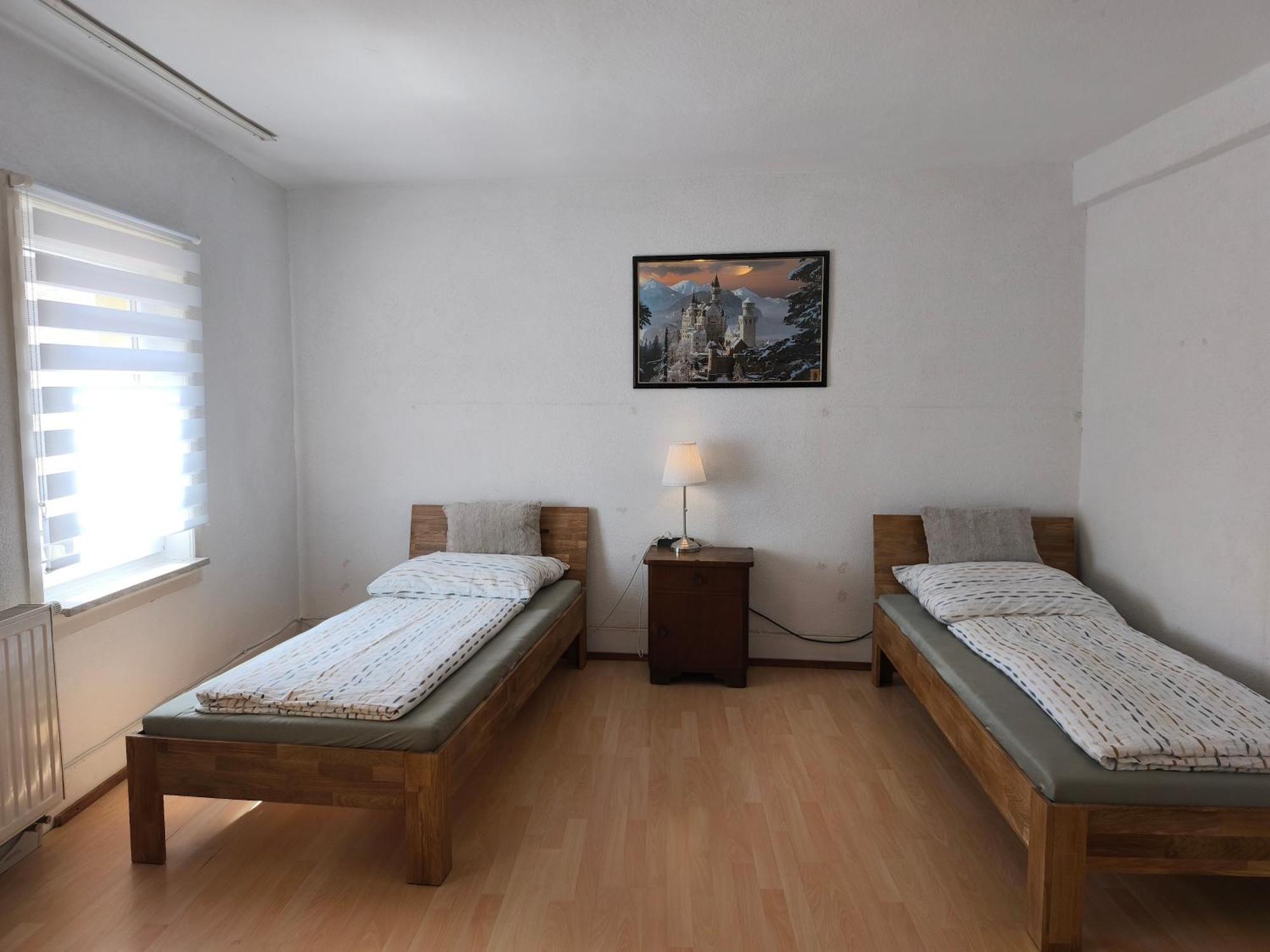 Doppel-/Zweibettzimmer mit Gemeinschaftsbad